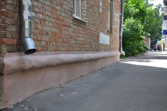 Выполнен ремонт цоколя на Попова, 18 "А"